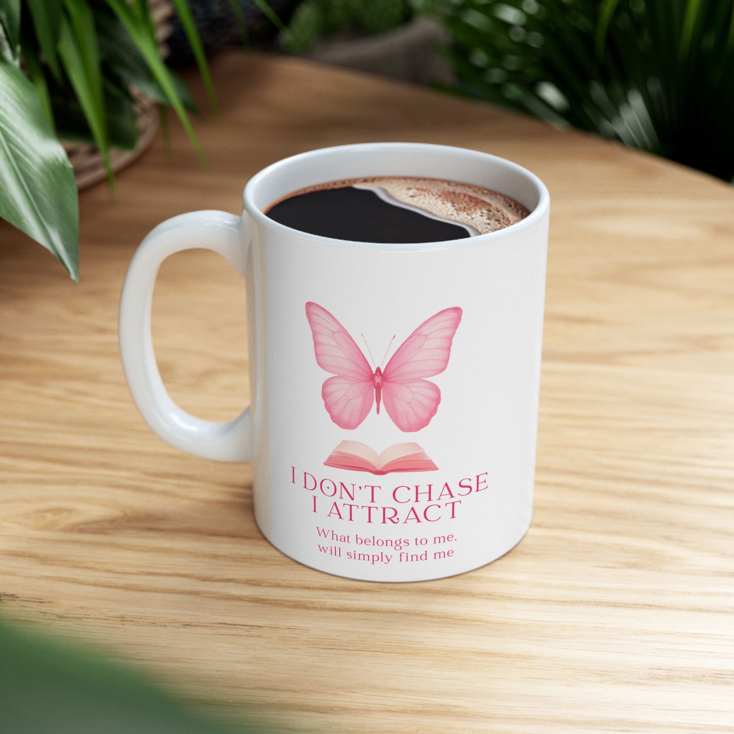 Butterfly & Book Ceramic Mug — "I Don't Chase, I Attract" Inspirational Quote